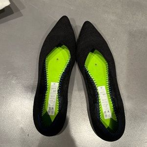 Rothy’s black point toe flat